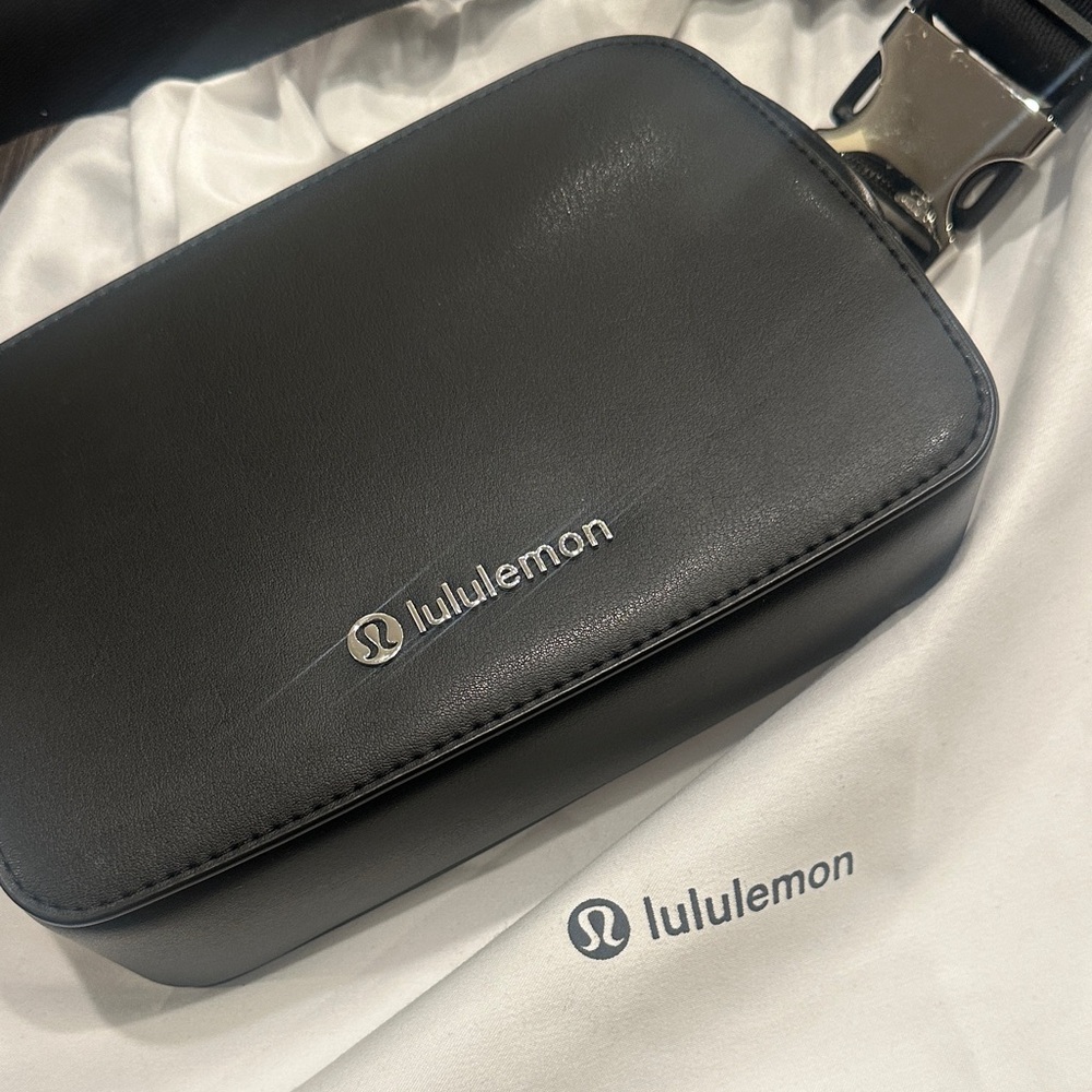 lululemon black leather belt bag with silver logo like new